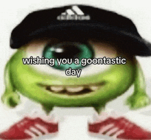 mike wazowski from monsters inc is wearing a black hat and red shoes .