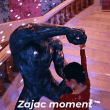a picture of a woman dancing with a monster that says " zajac moment " on the bottom