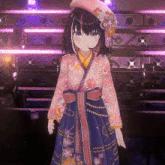a girl wearing a kimono and a pink hat is standing on a stage