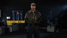 a man in a black leather jacket says hey chat sebastian stan