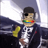 a man wearing a skeleton costume with a monkey face on his face