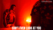 a man looking at himself in a mirror with the words " can 't even look at you " above him