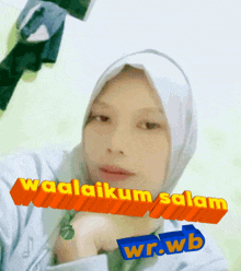 a woman wearing a white hijab with the words waalaikum salam wrwb on the bottom right
