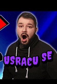 a man with a beard is making a funny face and the words usracu se are behind him