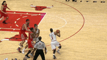 a basketball game is being played on a united court