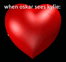 a red heart with the words " when oskar sees kylie " written on it