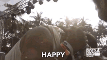 a man is laying on the ground with the word happy written on the bottom
