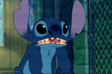 a close up of a cartoon character with the words just-a-happy-camper below it