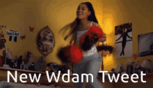 a woman is holding a stuffed animal and the words new wdam tweet are visible