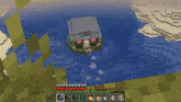 a screenshot of a minecraft game with a house in the middle of the water