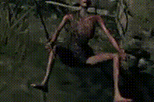 a blurry picture of a person holding a sword in their hands