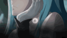 a close up of a person 's neck with a white circle on it
