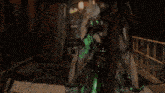 a woman in a green dress is walking down a street in front of a store that says here 's the real