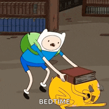 a cartoon character from adventure time is pushing a book on top of a yellow dog .