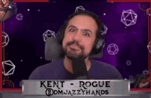 a man wearing headphones is talking into a microphone on a video call .
