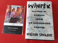 a book by joanne greenberg is next to a book by nigaan sinclair