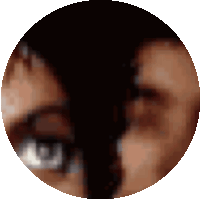 a close up of a person 's eye in a black circle