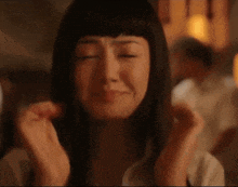a woman is crying and the word blackjack is on the screen