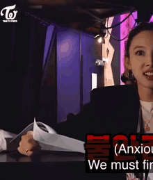 a woman is holding a piece of paper that says anxious we must fire