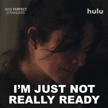 an advertisement for nine perfect strangers shows a woman looking down and says i 'm just not really ready