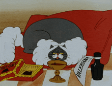 a cartoon cat laying on a couch with a sign that says valeriana on it
