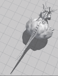 a 3d model of a monster with a long tail is sitting on a grid .