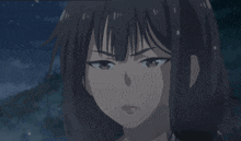 a close up of a person 's face with a very angry look on their face