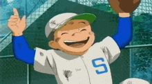 a boy in a baseball uniform with the letter s on it