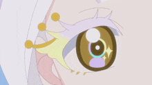 a close up of a person 's eye with a yellow ring around it