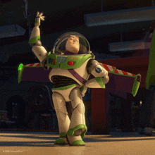 a toy story character named buzz lightyear is standing on a table