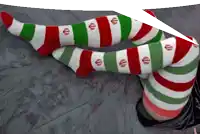 a person wearing red green and white striped socks with euro symbols