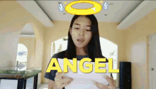 Angel Smiles GIF - Angel Smiles Reading GIFs