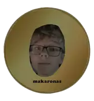 a gold coin with a picture of a man 's face and the word makaronas on it