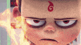 a close up of a cartoon character 's face with a red swirl on his forehead