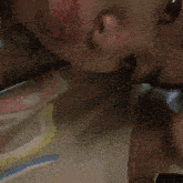 a blurry picture of a person 's face with a reflection of another person 's face