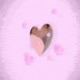 a man 's face is surrounded by pink hearts