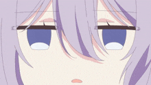 a close up of a person 's face with purple hair