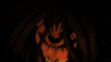 a close up of a person 's face with a fire coming out of it .