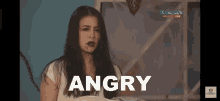 a woman with blood on her face is shown with the word angry above her