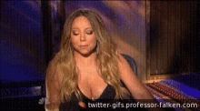 a woman with a very large breast is on a twitter gif