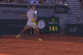 a bnp paribas ad can be seen in the background of a tennis match