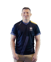 a man wearing a u.s. army shirt is dancing