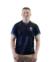a man wearing a u.s. army shirt is dancing