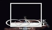 a picture of a man in a plaid shirt with the words number i on it