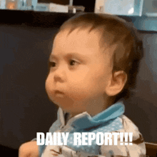 a baby with the word daily report written on his face