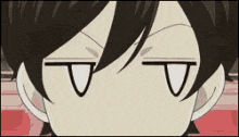 a close up of a person 's face with a smirk on it .