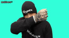 a man wearing a black beanie that says blizzard