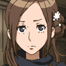 a cartoon girl with a flower in her hair has a sad look on her face