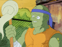 a green cartoon character with a blue headband holding a stick