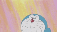 a cartoon character named doraemon is covering his mouth with his paw .